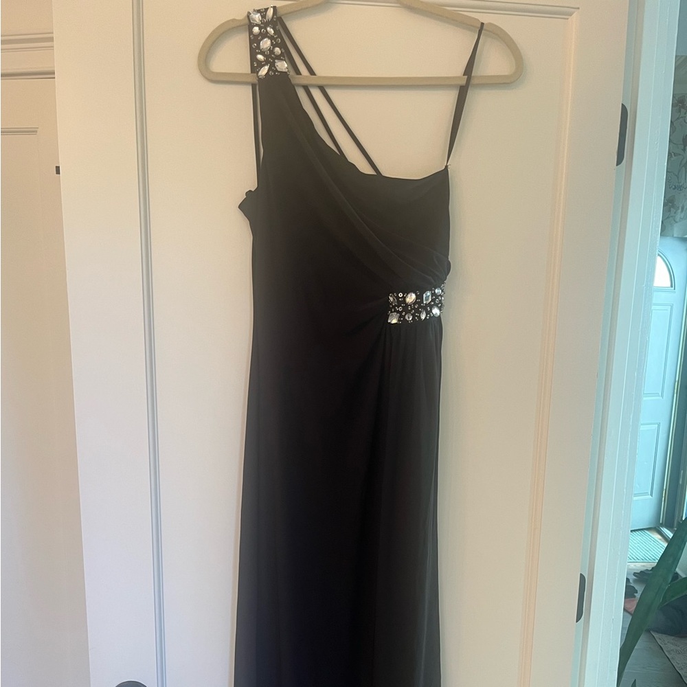 Formal one shoulder black dress.